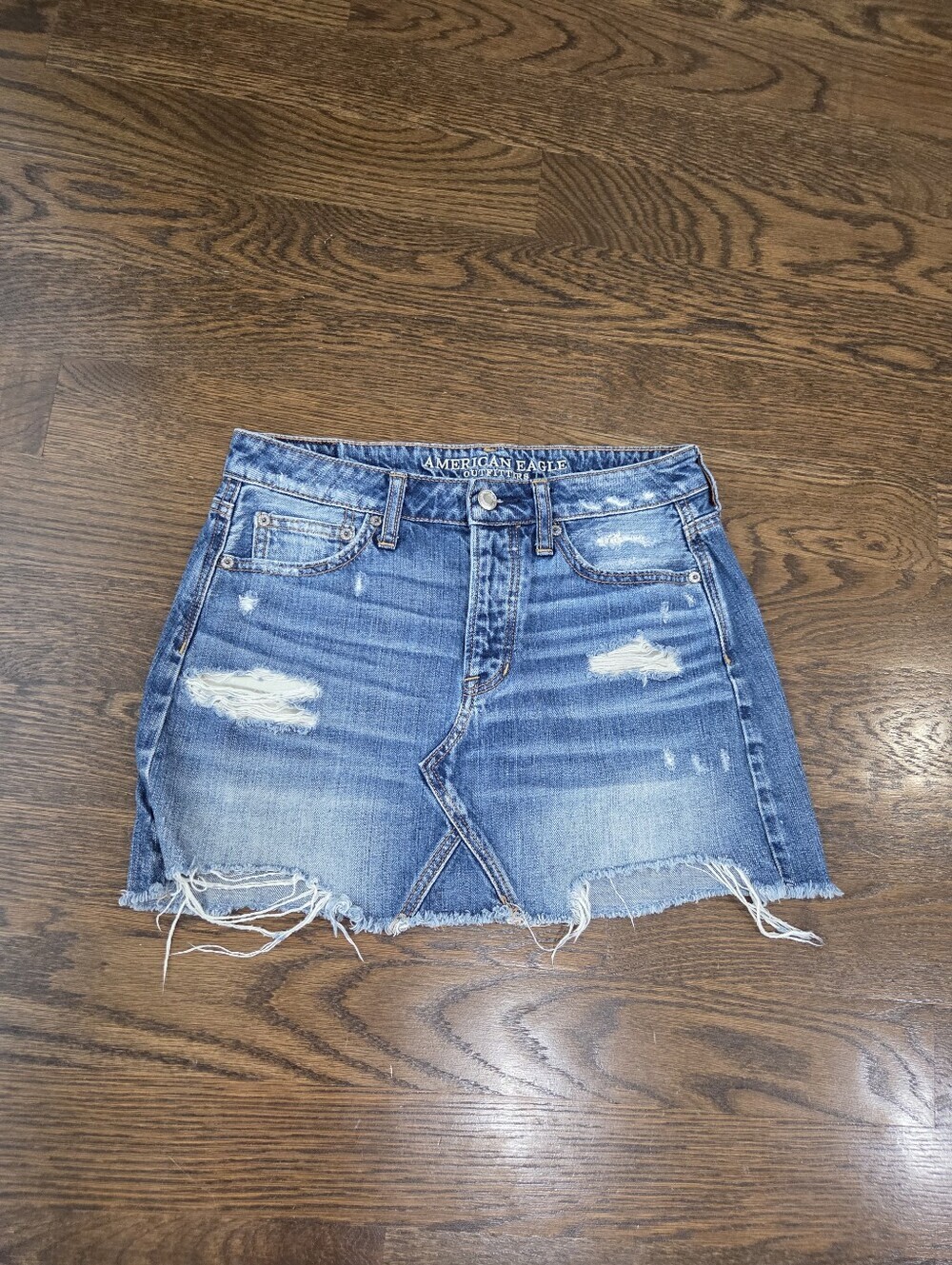 American Eagle Outfitters distressed blue denim mini skirt Sz.4